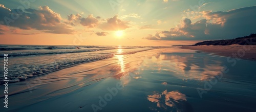 Sunrise at the Beach Centered to Take Advantage of the Perfect Reflection. with copy space image. Place for adding text or design photo