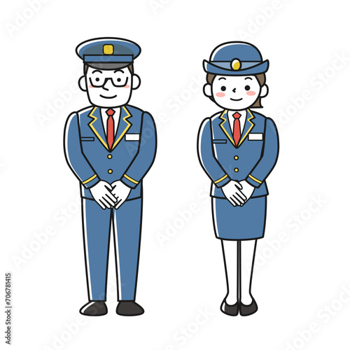 制服を着て立つ女性駅員と男性駅員