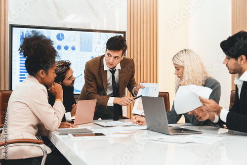 Portrait of professional smart business team discussion about start up project. Group of skilled businesspeople planing, brainstorming, sharing idea strategy. Discussion business meeting. Ornamented.