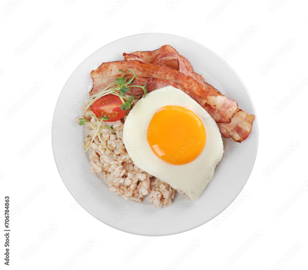 Tasty boiled oatmeal with fried egg, bacon and tomato isolated on white, top view Tasty boiled oatmeal with fried egg, bacon and tomato isolated on white, top view