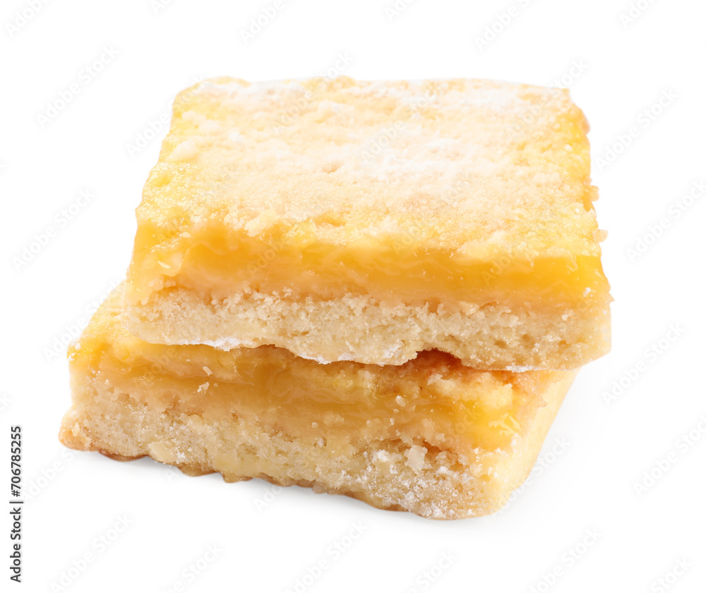 Tasty lemon bars with powdered sugar isolated on white Tasty lemon bars with powdered sugar isolated on white