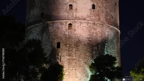 Beautiful night time view of the famous White Tower of Thessaloniki, Greece photo