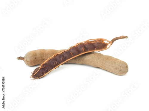 Fresh and perfectly ripe sweet tamarind.  Placed isolated on a white background.