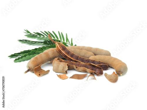Fresh and perfectly ripe sweet tamarind.  Placed isolated on a white background.