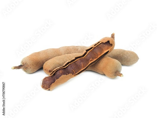 Fresh and perfectly ripe sweet tamarind.  Placed isolated on a white background.