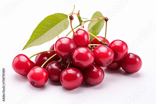 A stack of cherries is arranged on top of each other  near a cherry tree.