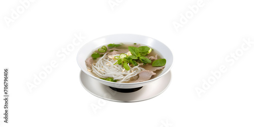side view of Traditional Vietnamese beef soup pho fill in the bowl garnish with onion and green leaves topping in white bowl with transparent background