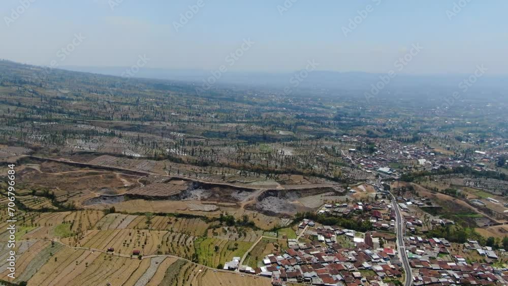 Agriculture fields and small villages in Indonesia, aerial view Agriculture fields and small villages in Indonesia, aerial view