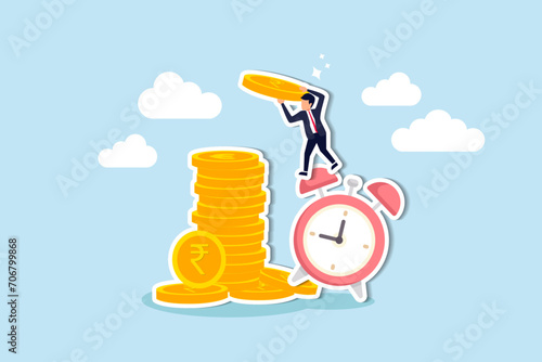 Long term investing or savings for retirement fund, compound interest or investment growth, tax time reminder concept, businessman on alarm clock put more dollar coin money to increase his savings.