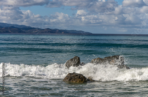 waves crashing on rocks near the shore on the Mediterranean Sea 2