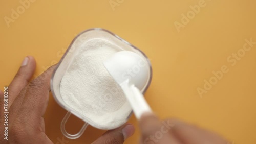  top view of spoon picks baby milk powder  photo
