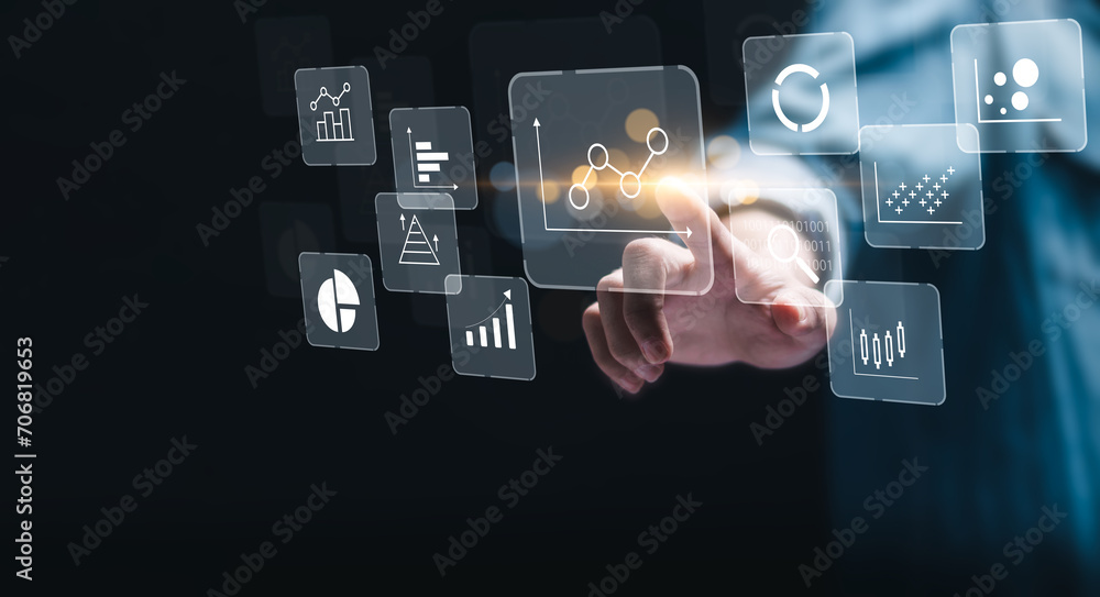 KPI Business analytics concept. Businessman touch virtual screen of data analytics report and key performance indicators on information dashboard for business strategy and business intelligence. KPI Business analytics concept. Businessman touch virtual screen of data analytics report and key performance indicators on information dashboard for business strategy and business intelligence.
