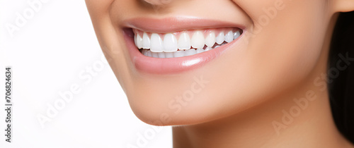 Close-up of smiling young woman with white teeth, isolated on white background, Dental ad concept.