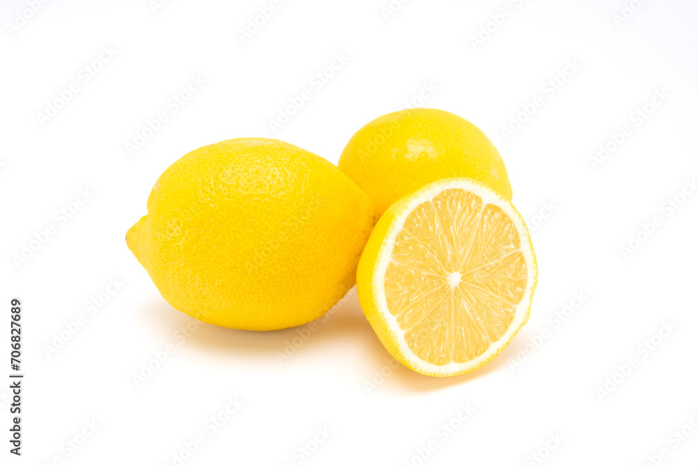 Close up cut in half of lemon isolated on white background. copy space. Close up cut in half of lemon isolated on white background. copy space.