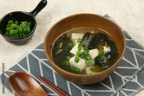 фотографія homemade Japanese miso soup in a bowl on the table.