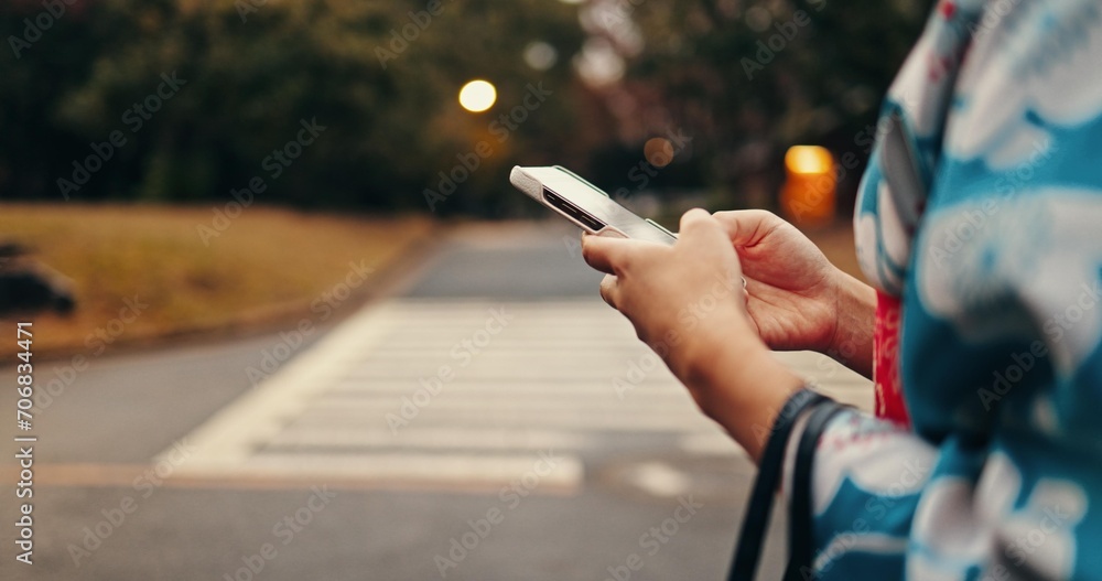 City, phone and hands of Japanese person in street for online networking, website and social media. Travel, walking and closeup of typing on smartphone with traditional fashion, culture and kimono - obrazy, fototapety, plakaty 