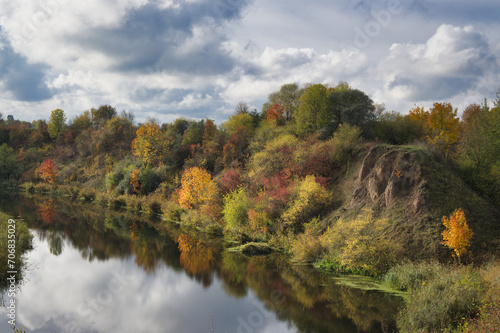 Calm and reflective water mirroring surroundings