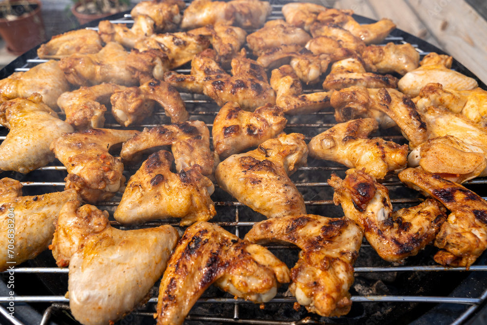 Chicken wings on the charcoal grill