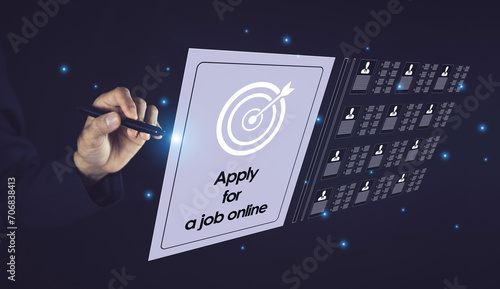 Man uses computer to apply for job online Find jobs that match your needs easily with the online job application system.