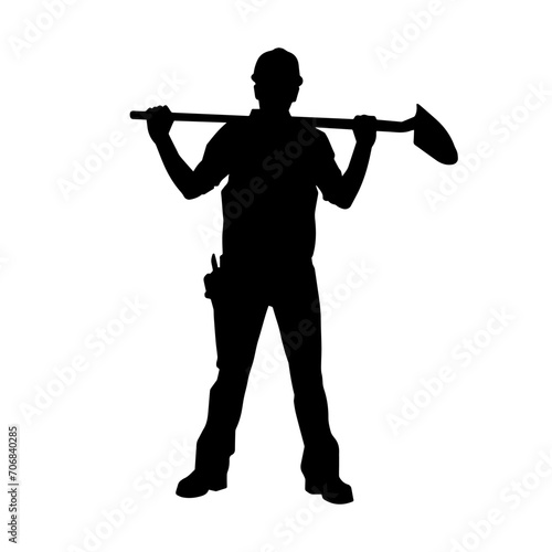 Silhouette of a worker carrying shovel tool. Silhouette of a worker in action pose using shovel tool.