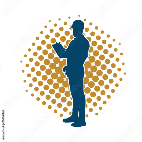 Silhouette of man in construction worker costume. Silhouette of construction worker male in pose. 
