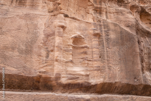 Pagan Nabatean altar carved into wall of the gorge Al Siq in the Nabatean kingdom of Petra in Wadi Musa city in Jordan