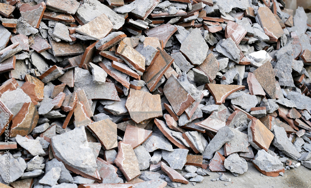 Piles of broken floor tiles from house renovations Piles of broken floor tiles from house renovations