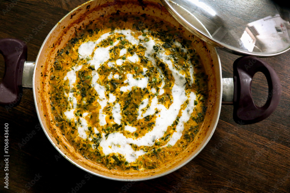 Methi Malai Matar, popular indian vegetarian main course served in Karahi Methi Malai Matar, popular indian vegetarian main course served in Karahi
