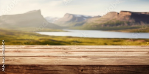 The empty wooden brown table top with blur background of Greenland in summer. Exuberant image. generative AI © Summit Art Creations