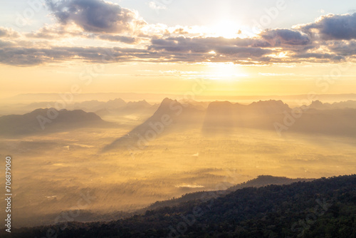 Beautiful sunrise at Phu Kradueng National Park, Thailand. © wannasak