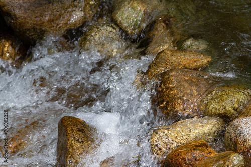 rushing water among stones