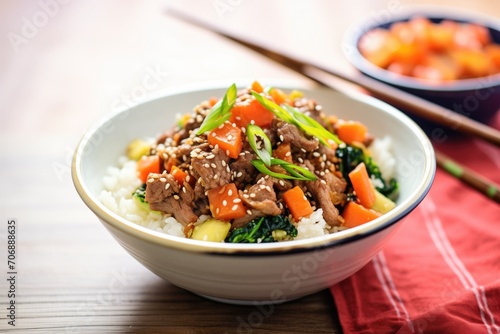 spicy beef teriyaki bowl with chili flakes and sesame