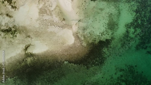 Drone footage reveals the abstract beauty of the beach at low tide near Puerto Princesa, Palawan, Philippines photo