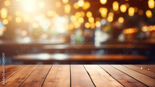Warmly lit wooden table in sharp focus with a vibrant, blurred background of a bar or restaurant setting.