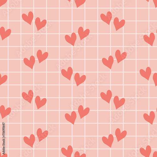 Seamless pattern with small hearts on a checkered background. The pink background for the day of St. Valentine, the Day of Lovers. Vector