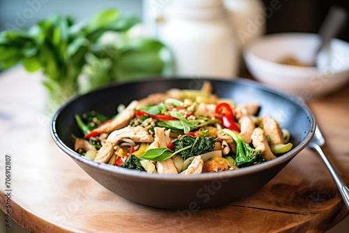 miso stir-fry with chicken and vegetables in a wok
