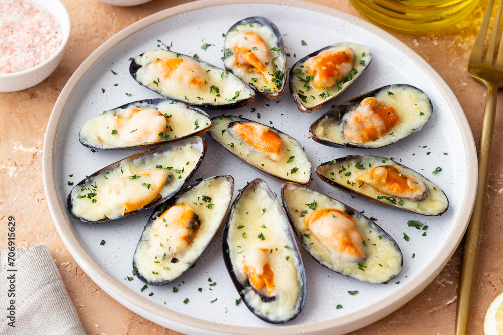 Baked mussels with cheese and herbs. Seafood. Healthy eating. Baked mussels with cheese and herbs. Seafood. Healthy eating.