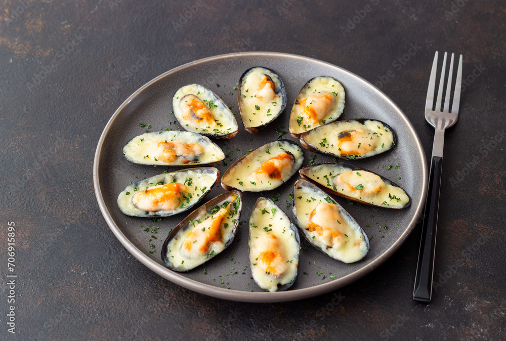 Baked mussels with cheese and herbs. Seafood. Healthy eating. Baked mussels with cheese and herbs. Seafood. Healthy eating.