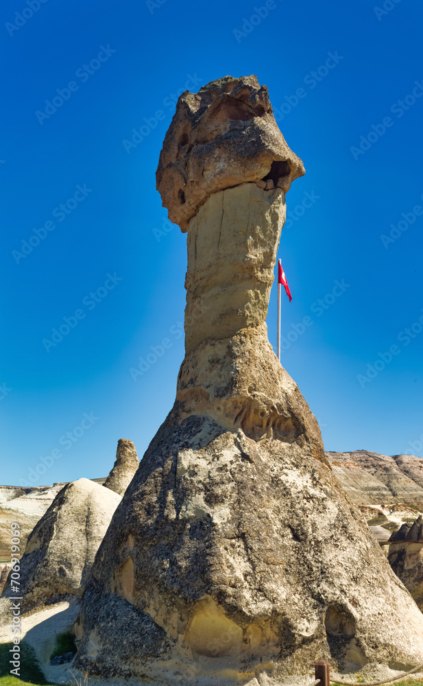 Cappadocia landscape soft volcanic rock, shaped by erosion into towers.