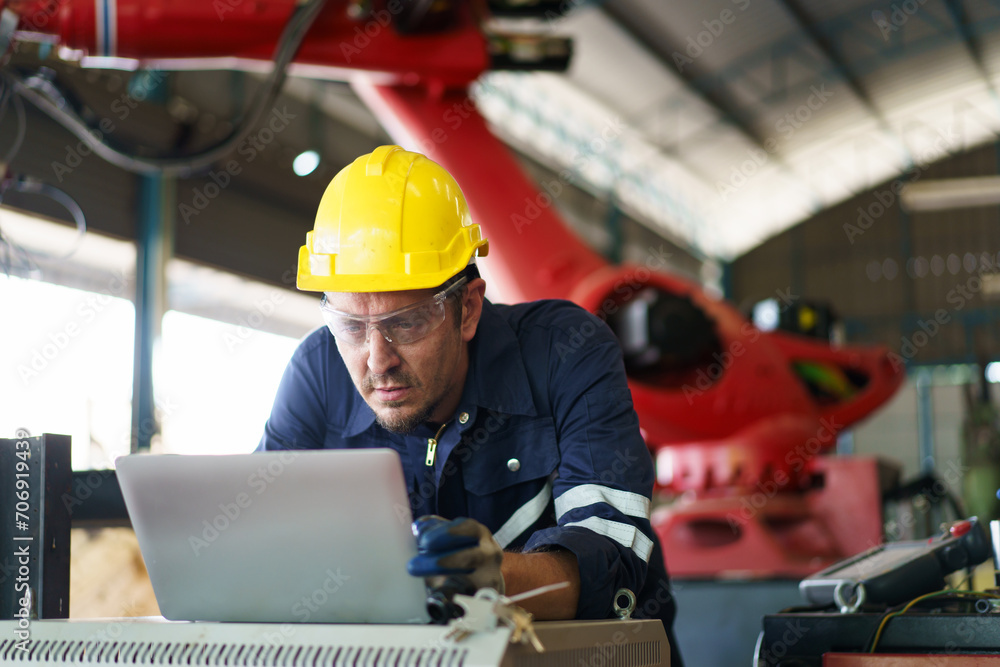 Robotic technician repairing - fixing a automated machine. Robotic technician repairing - fixing a automated machine.