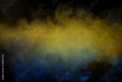 Blue and purple steam on a black background.