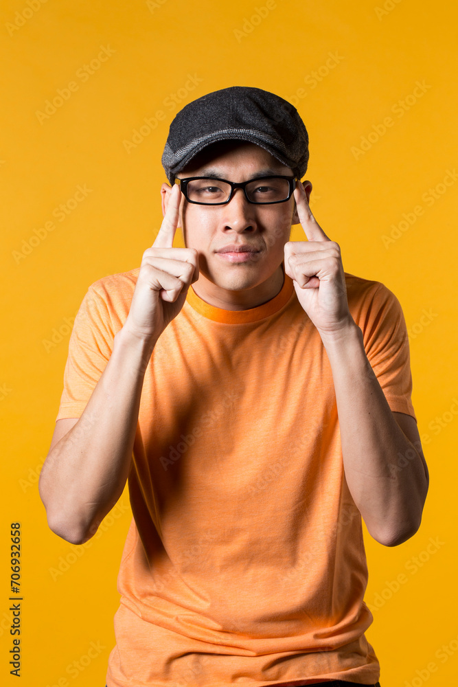 Fototapeta premium Young thoughtful Chinese man.