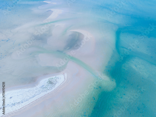 Abstract aerial view of water and sand patterns at the Elliot Heads Beach, Bargara, Queensland 