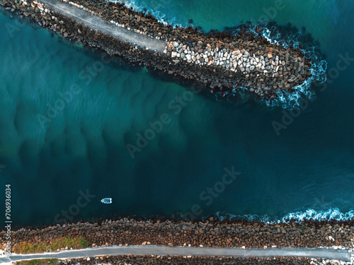 Aerial view of the boat in the river mouth at Brunswick Heads, New South Wales, Australia 