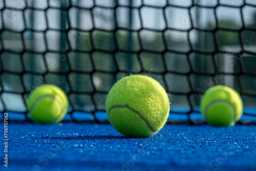 paddle tennis balls on a paddle tennis court © VicVaz