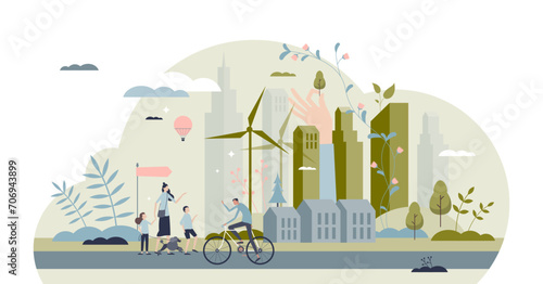 Cityscape with modern city and green residential houses tiny person concept, transparent background. Urban scene with skyscrapers and sustainable energy usage.