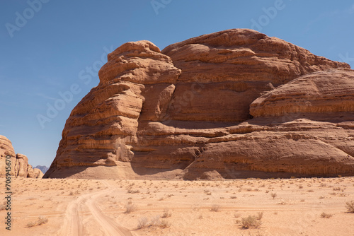 Majestic Rock Formation Dominating the Wadi Rum Desert Landscape