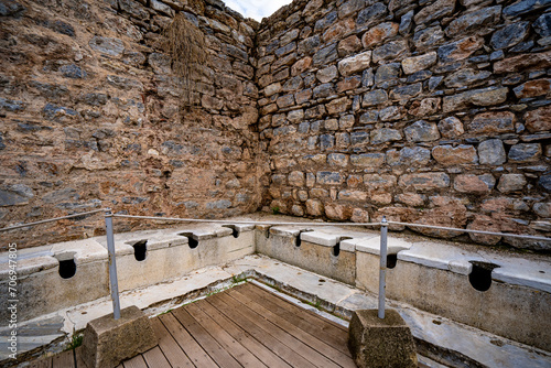 Bild auf Leinwand Public latrines in the Ancient City of Ephesus.