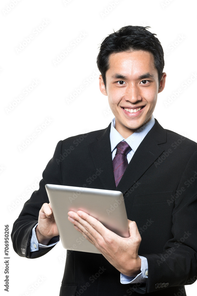 Asian businessman with a tablet computer. Asian businessman with a tablet computer.