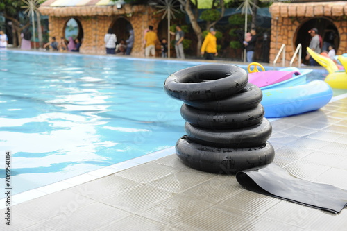 Rubber tires in the swimming pool of a hotel, Indonesia. tires stack for fun swimming on weekend and recreation